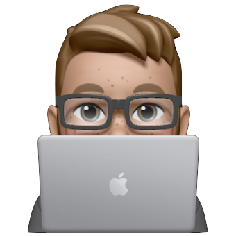 James behind an Apple laptop